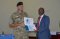 A course facilitator receives a certificate from the EASF Director after completion of the two-weeks' course on 19th July 2019.