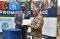 The outgoing military Technical Advisor to EASF Cdr. Stefan Sivaro from Finland receives a Certificate of Service from EASF Joint Chief of Staff Maj. Gen. (Dr.) Charles Rudakabana. 